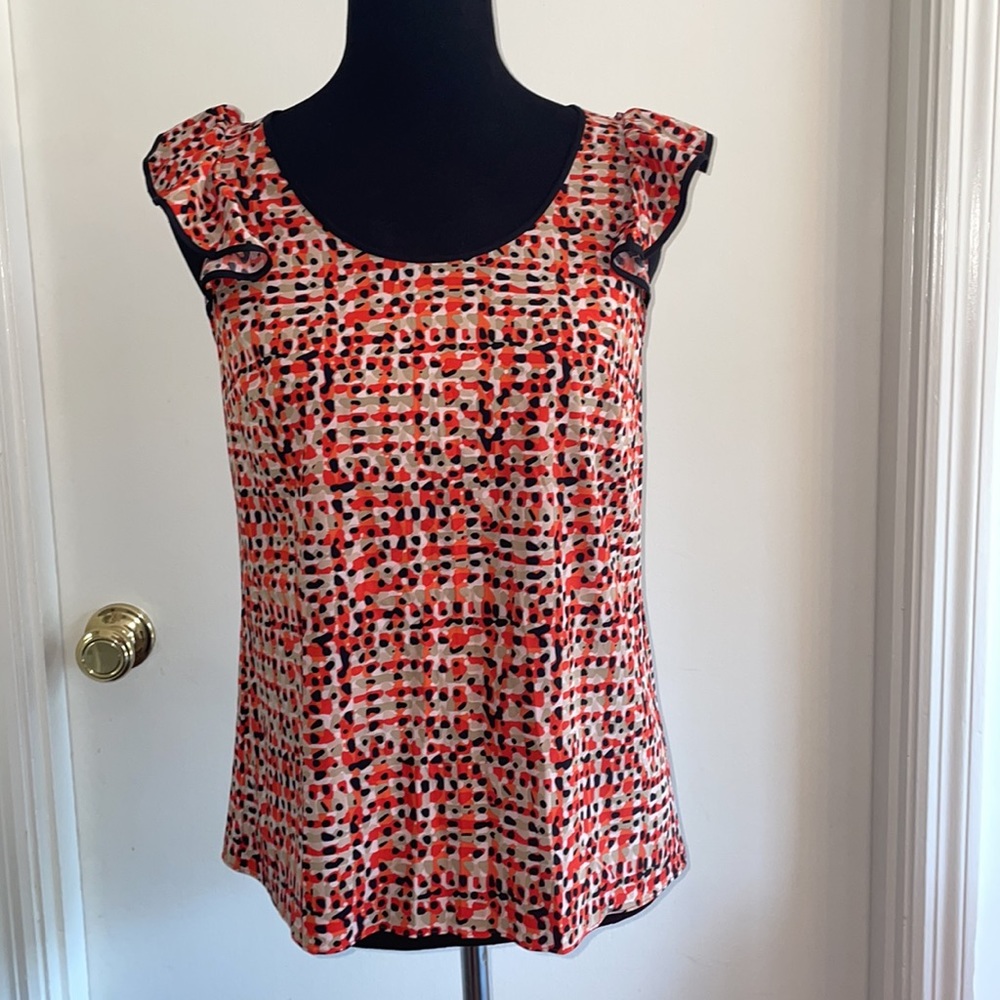 ANN TAYLOR summer blouse with flare sleeves. Size 2. Triangle peephole in back.